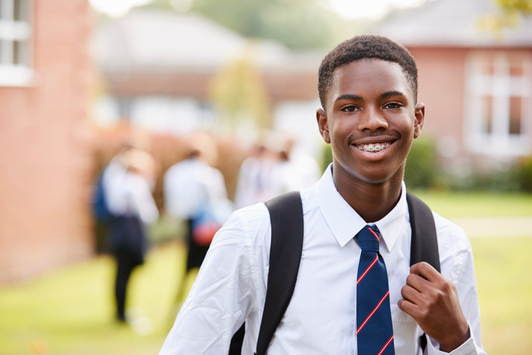 Portrait of Male Teenage Student in Uniform 